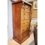 A Victorian mahogany Wellington chest, fitted with seven graduated drawers,