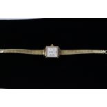 A ladies 14ct. yellow gold Eska wristwatch with 14ct. yellow gold strap, gross weight approx 16.