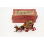 A boxed Schillco miniature stage coach.