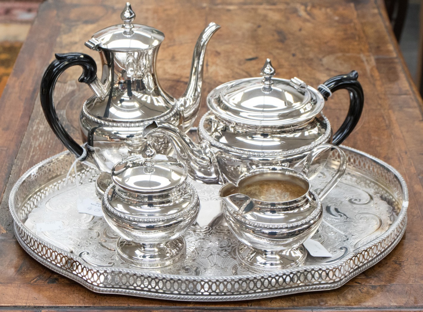 An Arthur Price four piece revival tea service with a gallery tray (5)