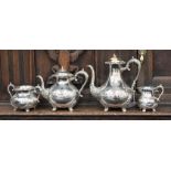 A four piece EPNS tea service with engraved design,