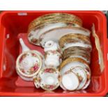 A box of Royal Albert 'Old Country Roses' part tea service, including teapot, cake plate,