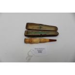 A Meersham and amber cased Edwardian cheroot holder