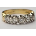 A diamond five stone 18ct gold ring,