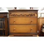 A collection of furniture comprising oak chest of drawers and a matching dressing table, a tallboy,