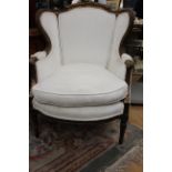 A 19th Century wing back chair,