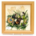 A Moorcroft limited edition framed plaque, The Gentle Fellow pattern, 65/100, dated 1915,