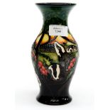 A Moorcroft vase in the Moonlight Badges pattern, standing approx 19.