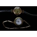 A ladies yellow metal wrist watch circa 1920s with another ladies wrist watch (2)