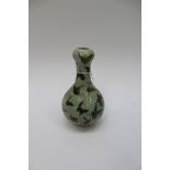 A Chinese double gourd vase, green ground with Butterflies, and blue character mark to underside,