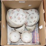 A set of four hand painted Victorian tea bowls and saucers,