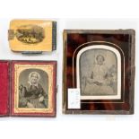 Two Victorian glass daguerreotype photographs and a Mauchline ware Blackpool note book