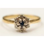 An 18ct gold sapphire and diamond ring, size K1/2 with a total gross weight 2.