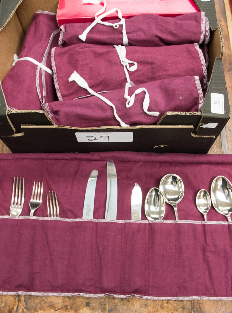 A Roberts and Belk Ltd canteen of cutlery, stainless steel, 12 place setting, in original pouches,