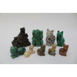 A group of hardstone cats, including jade, malachite,