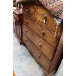 An early Victorian mahogany chest of drawers, the upper section with a hinged top,