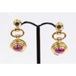 A cased pair of drop earrings,