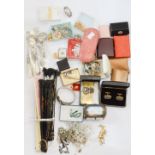 A bag of assorted costume jewellery, Stratton compact, fans,