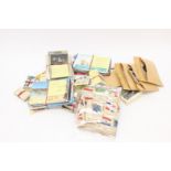 A collection of approx 200 postcards with a collection of cigarette cards, photos, silks,