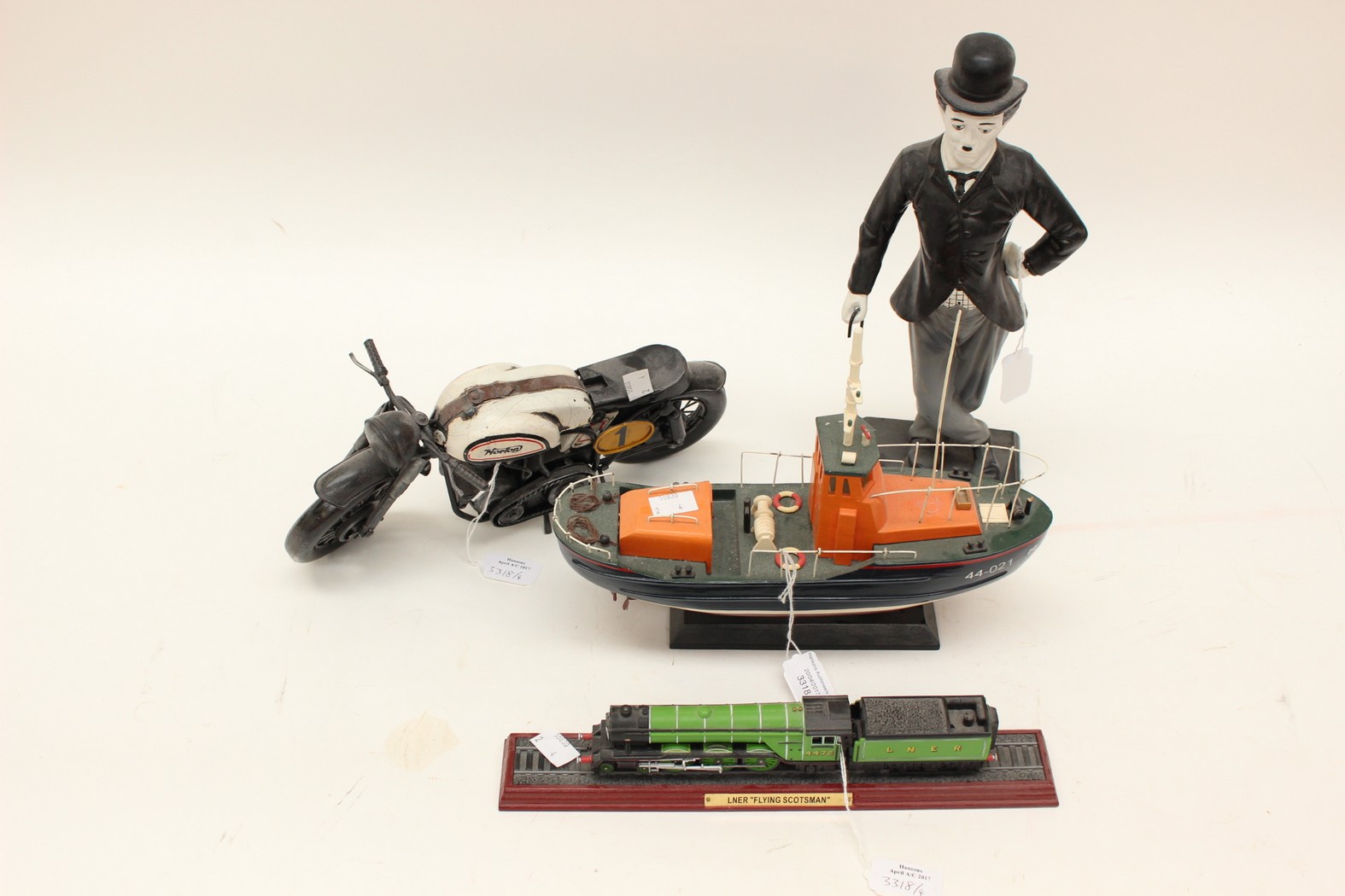 A model train, life boat,