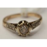 A diamond illusion set rose gold and white metal set ring, old European cut diamond approx 0.