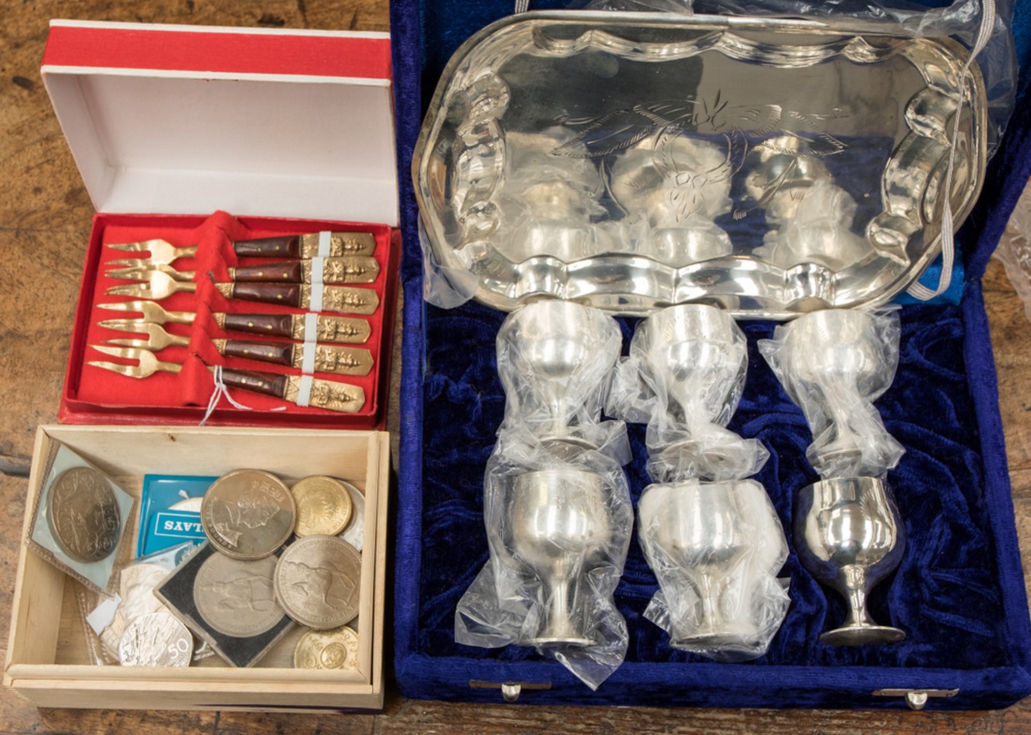 Box of coins, EPNS boxed egg cup set,