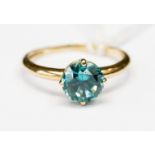 A blue zircon single stone 9ct gold dress ring, size P,