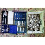 A box of assorted flatware, napkin rings, etc.