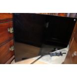 A Samsung TV, large size,