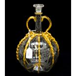 An Italian glass twin handled white decanter, with gilded detail, etched birds and grape design,