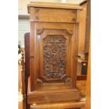 A pair of Edwardian mahogany pedestal cabinets, each with a single drawer over a single door,