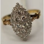 A diamond marquise shaped cluster ring the round brilliant cut diamonds weighing a total of approx