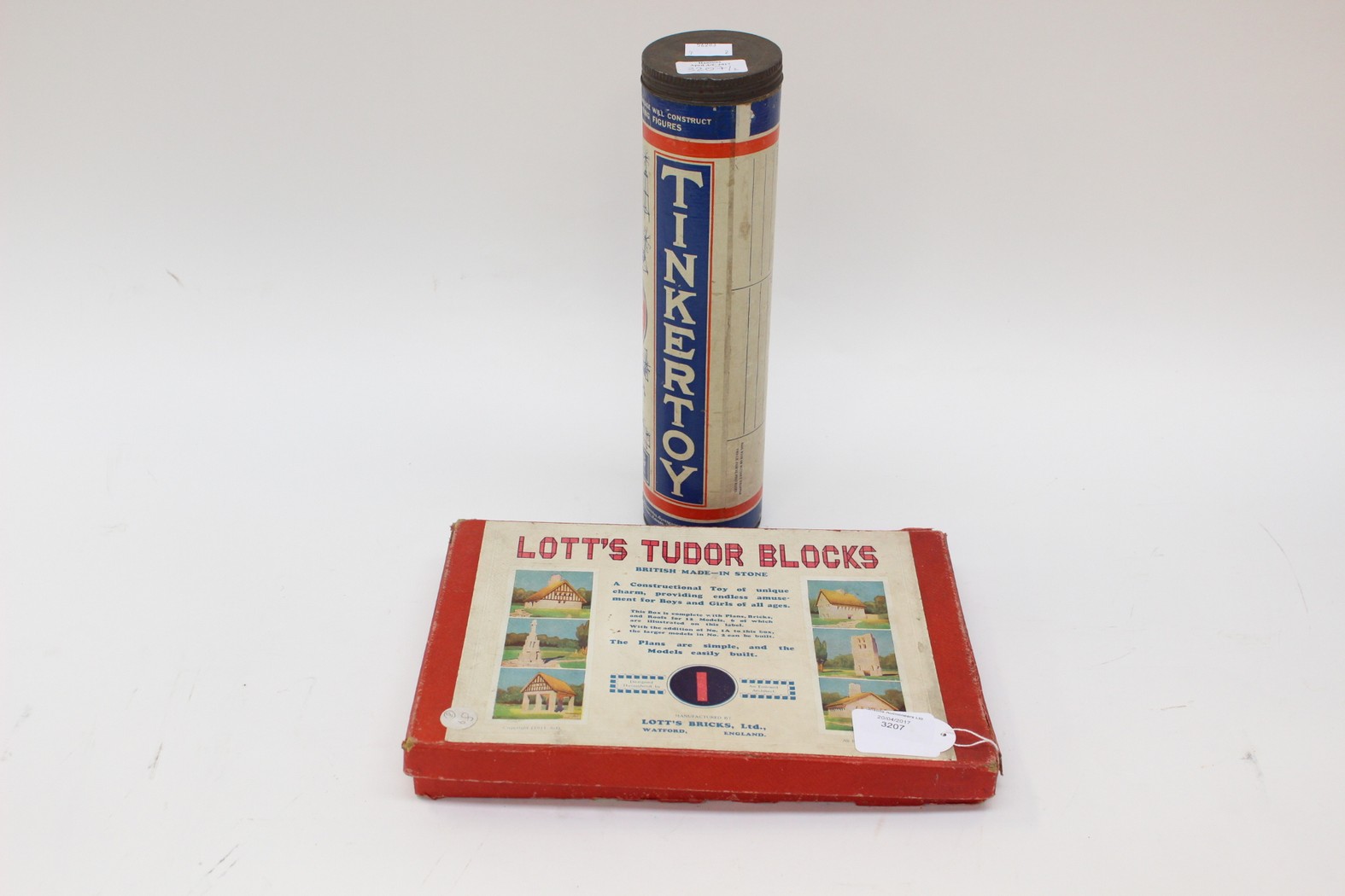 A Tube of Tinkertoy and Lotts Tudor blocks (2)