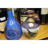 Rutherford's 10 year old whisky in ceramic flagon and Whyte and Mackay whisky in blue ceramic