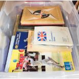 A box containing sporting memorabilia,