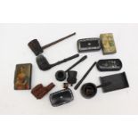 A collection of assorted snuff boxes and wooden pipes (one bag) to include a snuff box in niello