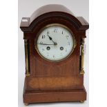 An Edwardian mahogany mantel clock