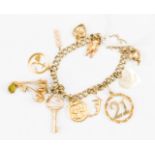 A 9ct gold charm bracelet, 22.