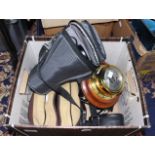 A box of assorted cameras and binoculars,