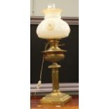 A brass oil lamp,