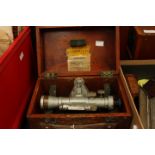 A Clarksons Dumpy Level 1960s, in a wooden case,