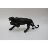 An Oriental bronze model of a tiger, 18th century or earlier,