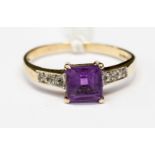 A 9ct gold amethyst and diamond chip ladies dress ring,