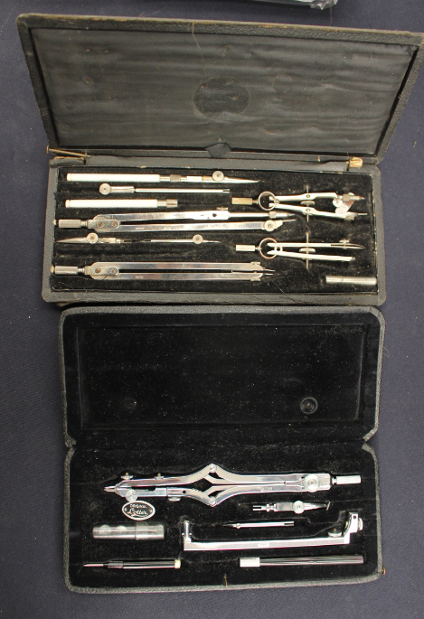Two complete technical drawing sets in original case