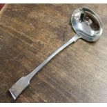 A Victorian Scottish silver soup ladle in a fiddle pattern, single engraved initial,