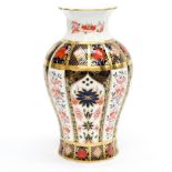 A Royal Crown Derby 1128 Imari pattern solid gold band vase, of inverted baluster form,
