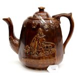 A circa 1870/80s Religious teapot 'Rebecca at The Well' earthenware producers name impressed base