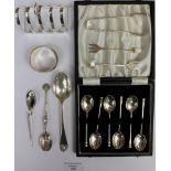 A cased set of six silver coffee spoons, Birmingham 1961 with three further spoons, sugar nips,