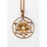 A 9ct rose gold cultured pearl flower head design pendant and chain