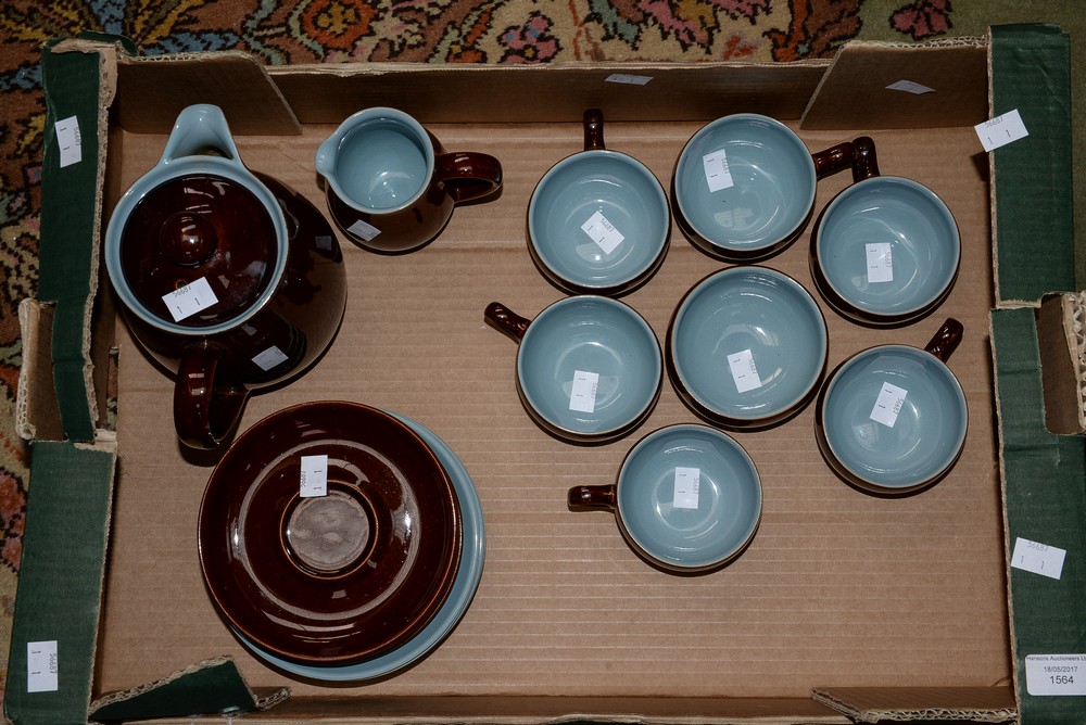 A Denby, brown glazed, stoneware coffee set with blue interior, including: cups; pot; saucers, etc.